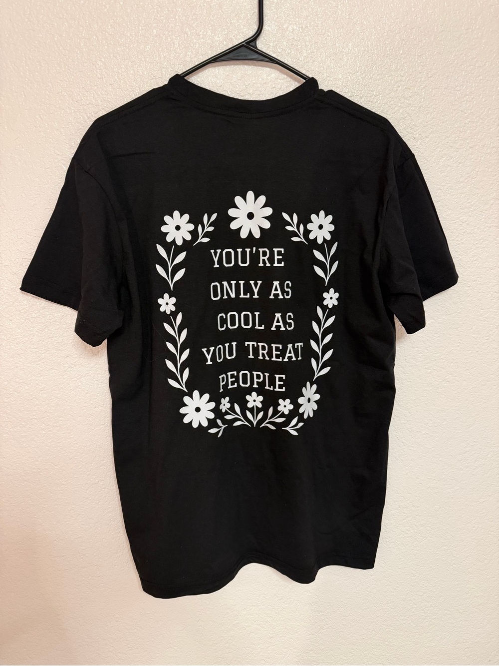 Source Unknown Black Short Sleeve Tee with White Floral Quote
